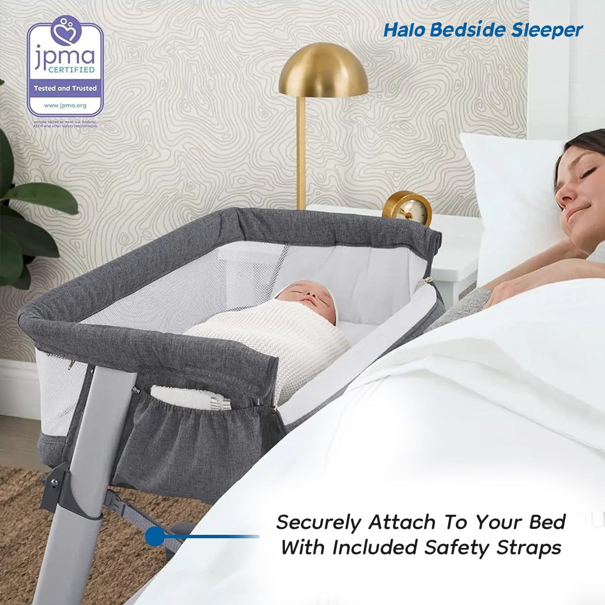 Safety straps securing the Halo bedside sleeper to an adult bed